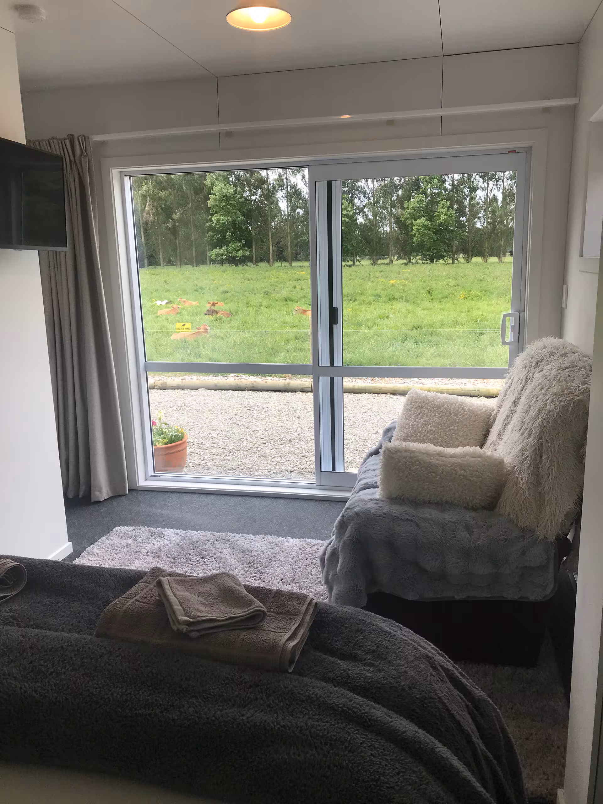Bedroom lounge with farmland view